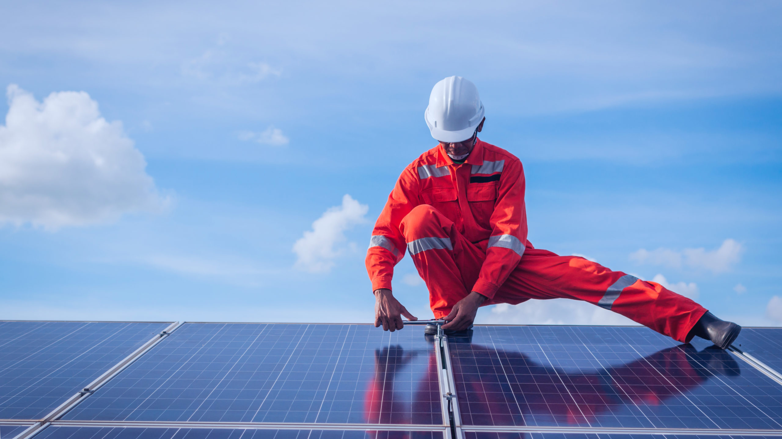 operation and maintenance in solar power plant ; engineering team working on checking and maintenance in solar power plant ,solar power plant to innovation of green energy for life